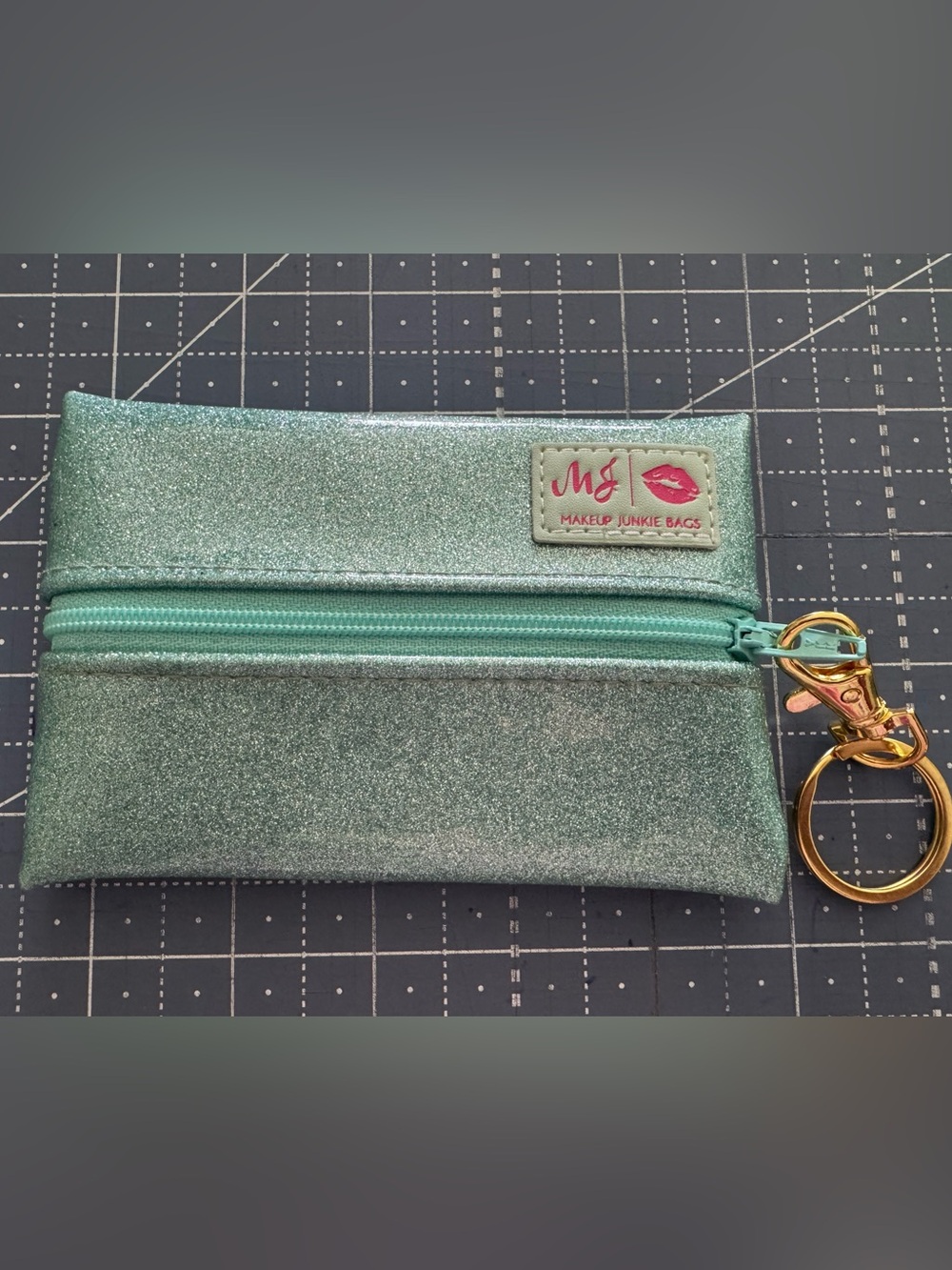 Makeup Junkie Micro zipper pouch with keychain. BRAND NEW!